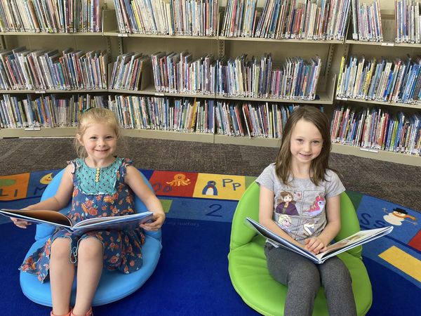 children reading book library